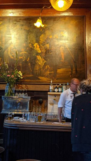 Inside Hoppe, an old brown bar